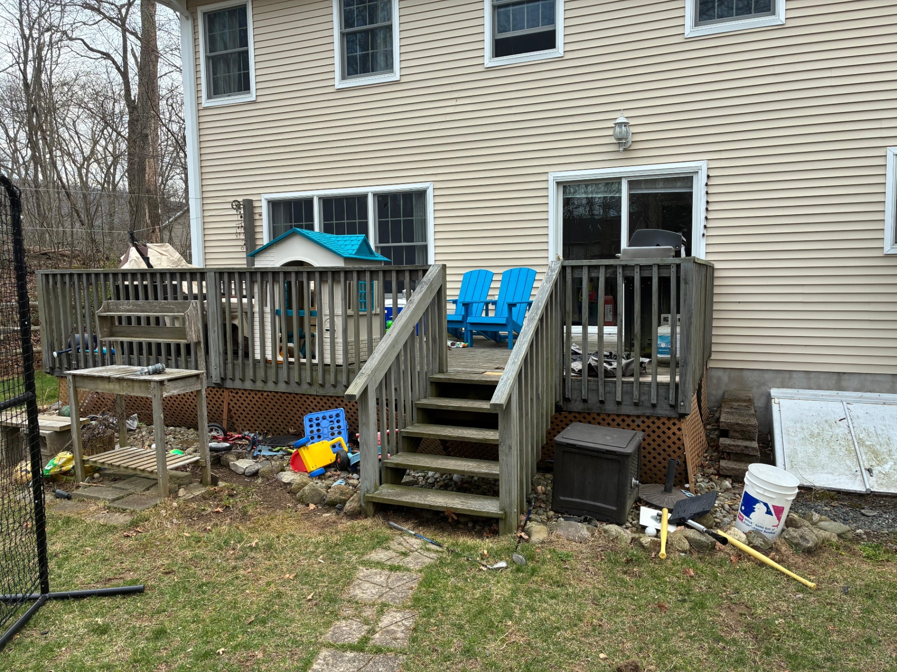 Weathered backyard deck before restoration in Oak Ridge, New Jersey